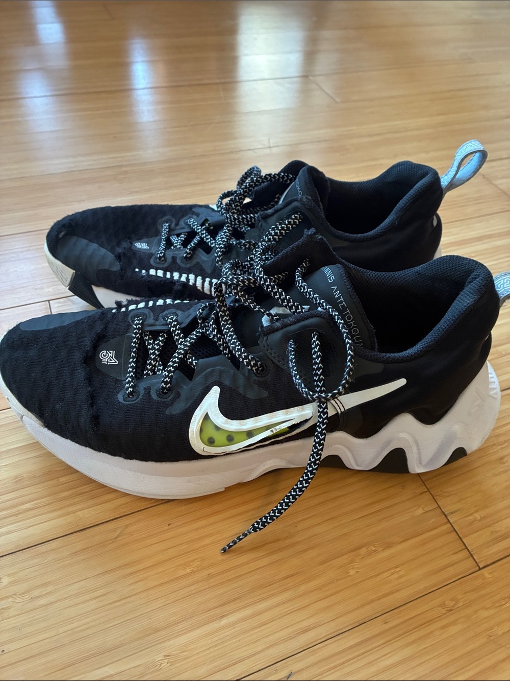 Nike Black and White Men's Athletic Shoes with Lime Swoosh Detail